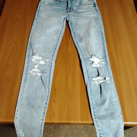American Eagle Light Blue Ripped Jegging Super Stretch Jeans Size 0 25w - Picture 1 of 9